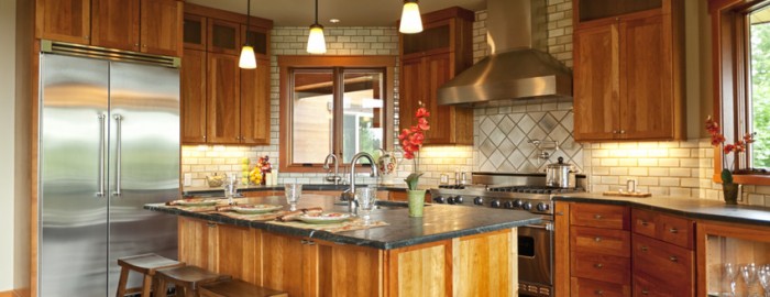 a gourmet kitchen in a luxury home in a gated community