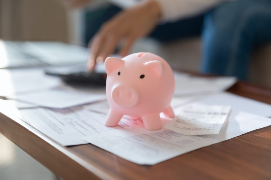 Piggy bank on paperwork when calculating down payment